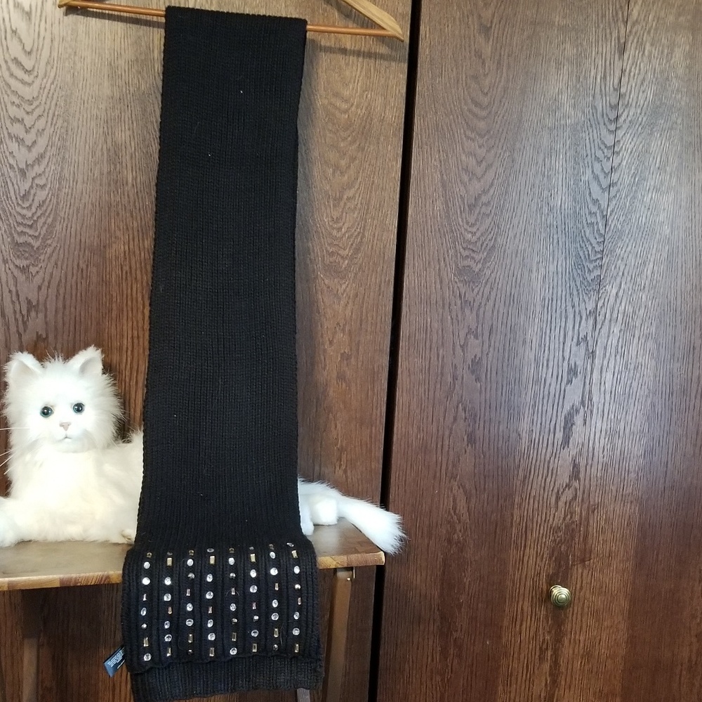 Mix it black ribbed long scarf with embellishments